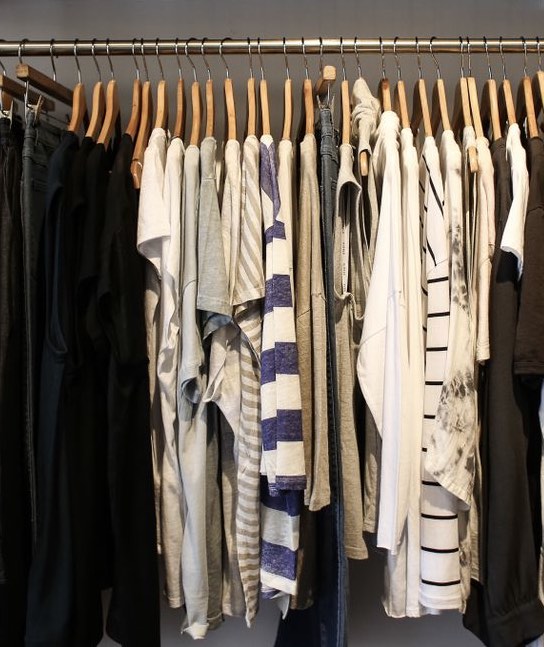 Rack of neatly hung clothing